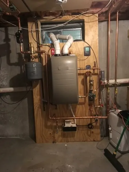 Wall-hung boiler with zone piping and expansion tank